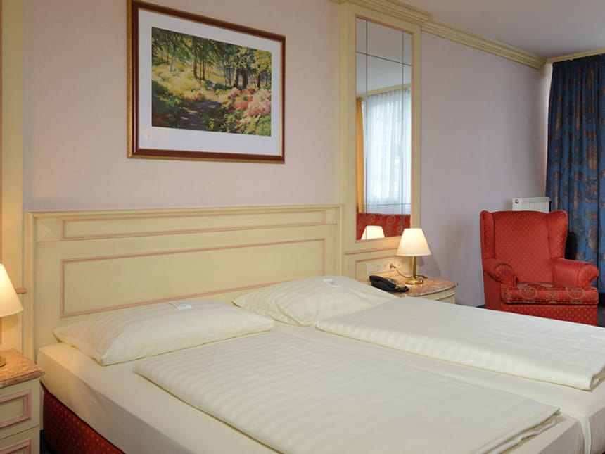 Doppelzimmer mit einer Sitzgruppe