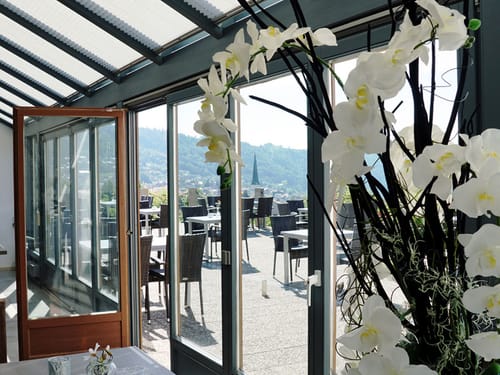 Wintergarten mit Zugang zur Terrasse